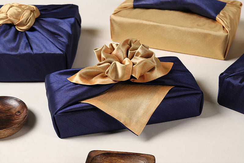 Taupe and deep blue work together to create a superb fabric wrapping suited for both Doljanchi and Christmas Day.