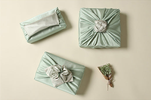 Sage and ash colored Bojagi Korean fabric wrapping is flawless and will work great for spring and summer gatherings.