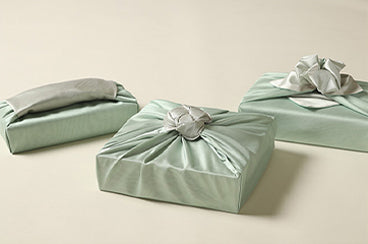 Purchase this greenish-blue and grayish Korean gift wrapping cloth Bojagi to captivate the audience anywhere you go.