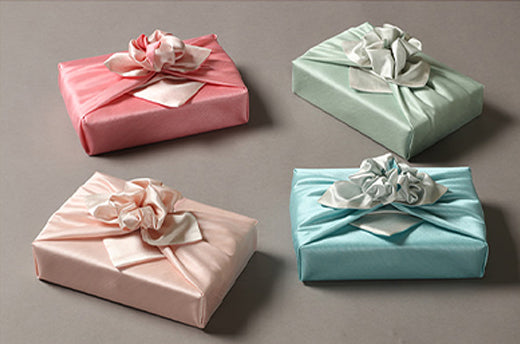 Light titian and peach luxury gift wrap will look amazing at a birthday party for a girl of any age.