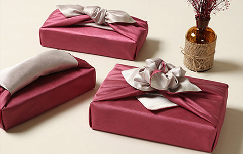 It doesn't matter what awkward shape the present is you can use the Bojagi gift cloth in cardinal red and slate to wrap any special item.