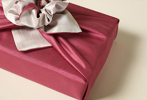 A close image of the crimson and pewter Korean gift wrapping cloth. It can be used during Seollal, Christmas, or other celebration since we have so many Bojagi for sale.