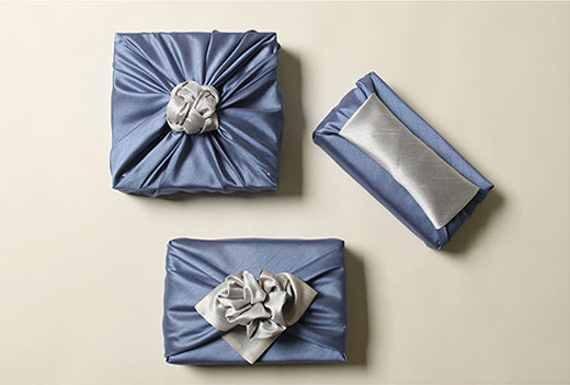 Indigo and sterling double sided fabric wrapping paper is the ultimate way to end any special gift for that love of your life.