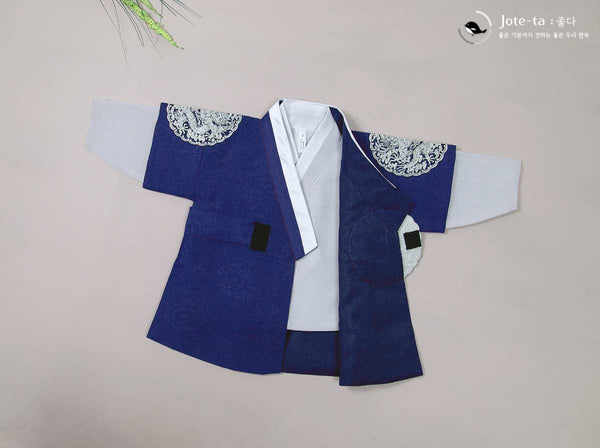 Top piece, opening the vest of our navy baby boy hanbok