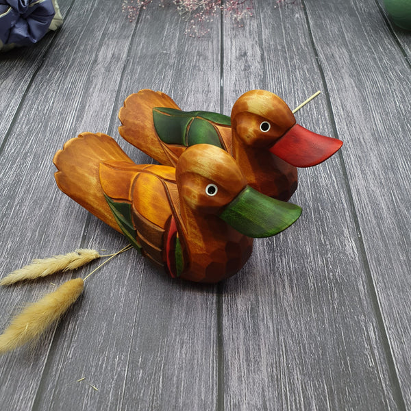 The woodwork is precise and the colors are vibrant on this saekdong wooden duck. This is our premium selection.