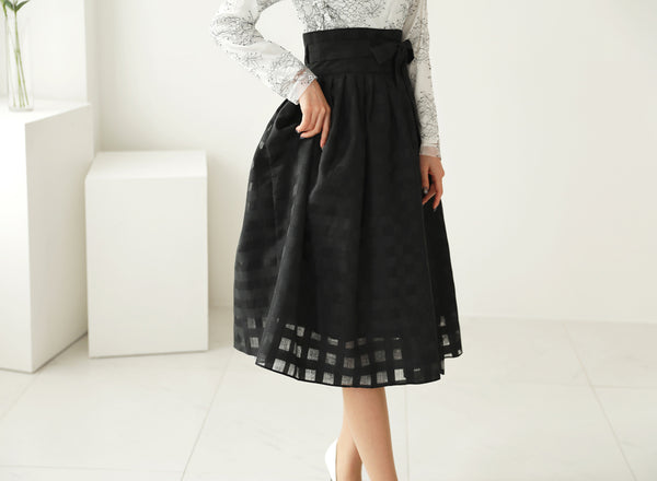 A perfect modern hanbok dress in chalk-white with dark black floral detail that goes well with even a pair of jeans.