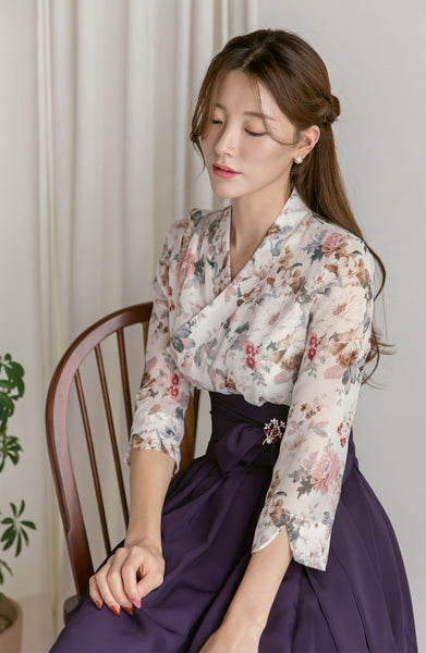 Add a hint of Korean culture into your wardrobe with the off-white flower modern hanbok dress.