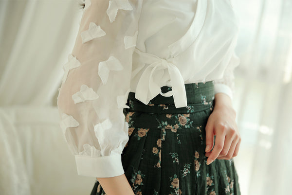 You can proudly wear Korean elements without a full hanbok with this deep ivory butterfly modern hanbok blouse.