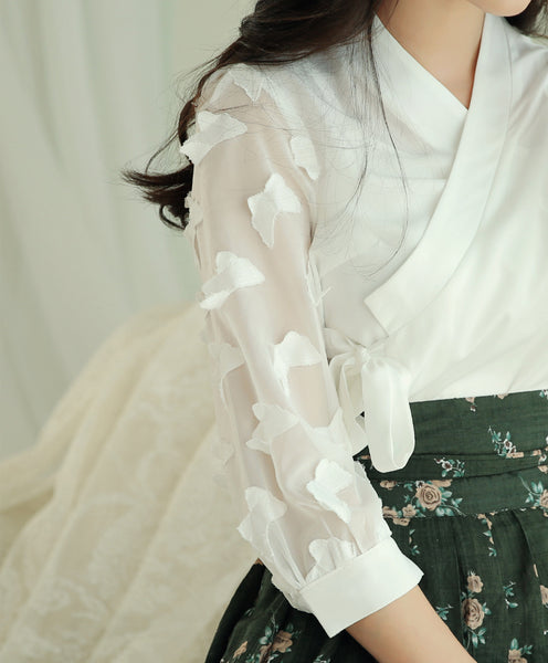 You can see the lovely butterfly details in this close-up picture of the alabaster modern hanbok blouse.