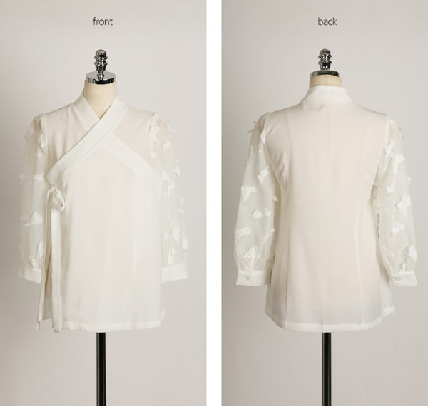 You'll see just how gorgeous this cream colored butterfly modern hanbok blouse is when you look at the full view.