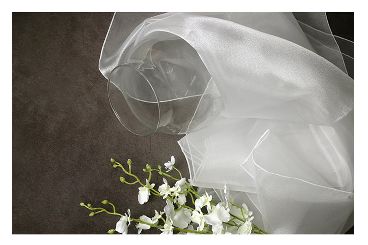 The chalky-white lucid Korean Bojagi is timeless if you're wrapping wedding presents with fabric.
