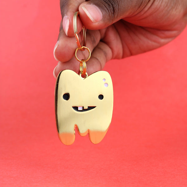 gold tooth keychain