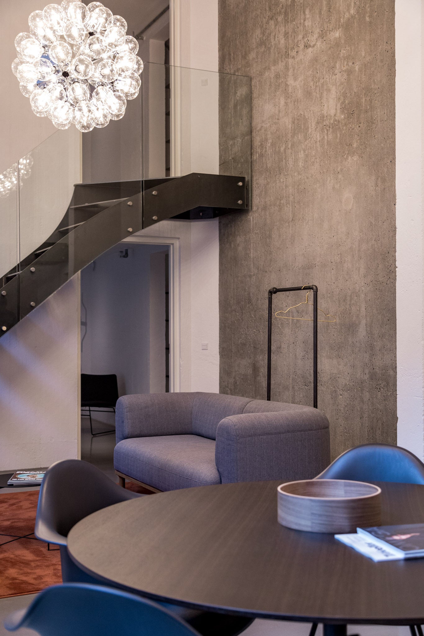 Concrete wall and industrial interior in exclusive apartment in Copenhagen