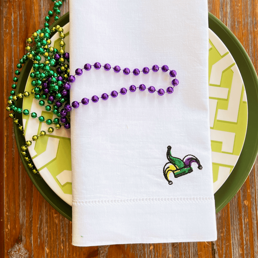 https://cdn.shopify.com/s/files/1/0393/1893/products/mardi-gras-jester-hat-monogrammed-cloth-dinner-napkins-set-of-4-napkins-white-tulip-embroidery-2_1024x1024.png?v=1676314740