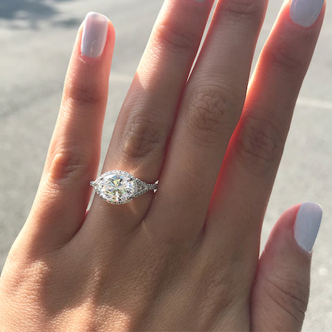 east-west set oval engagement ring 