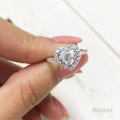 heart shaped diamond engagement ring with diamond halo