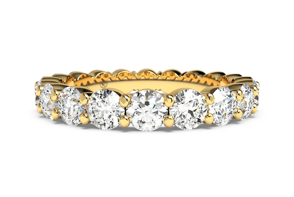 yellow gold shared prong eternity ring