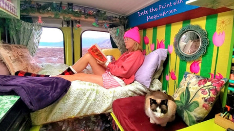 megan aroon and her cat mikee enjoying the solitude of solo female van life in her tiny home mobile studio