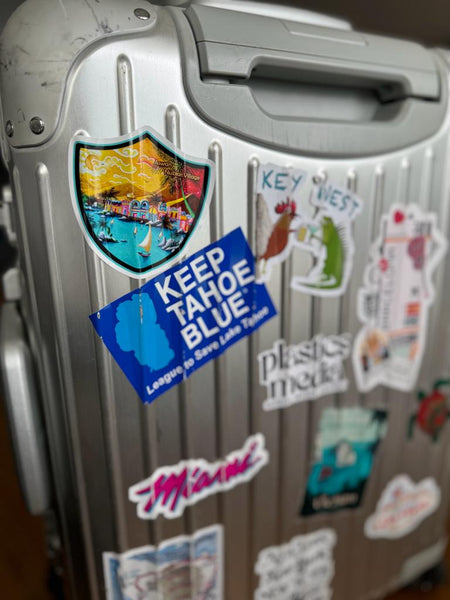 nubian village travel art sticker on a suitcase inspired from visiting egypt in 2023 by traveling artist meganaroon