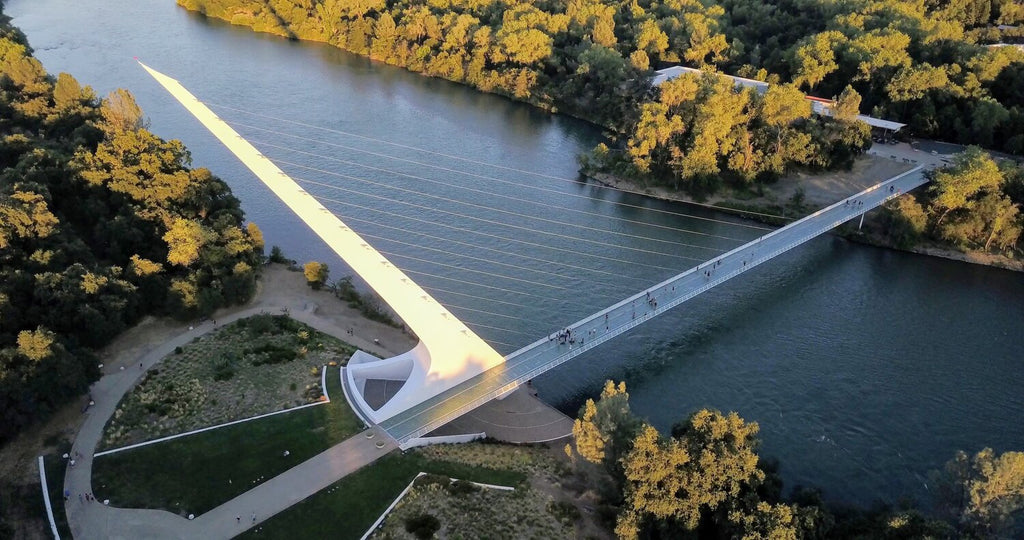 the iconic sun dial bridge overhead view at turtle bay in downtown redding on the sacramento river trail paved bike path