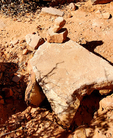 trail cairn example 1 of stacked rocks to guide us on the trails MeganAroon Travel Blog