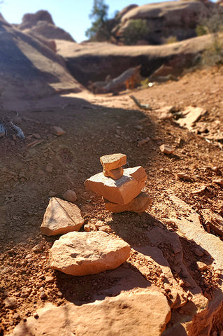 trail cairn example 1 of stacked rocks to guide us on the trails MeganAroon Travel Blog