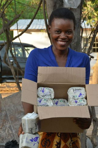 Woman holding sanitary pads