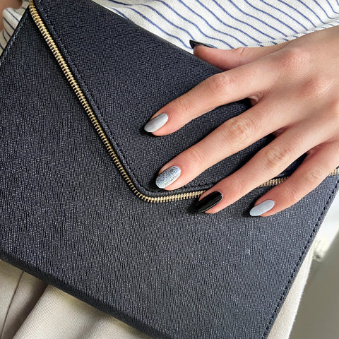 Multiple coloured manicure with silvers and greys