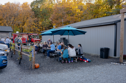 The outdoor seating is full at Tanglewood Winery's Tasting Room during the fall.