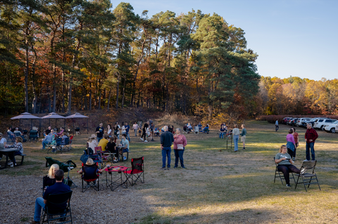 A crowd of people enjoy the outdoor space at Tanglewood Winery's Tasting Room during the Fall Festival.
