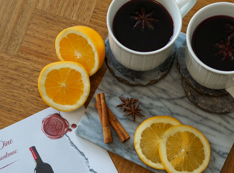 Two mugs of mulled red wine using Tanglewood Winery's Frontenac are ready to drink after being warmed on the stove.