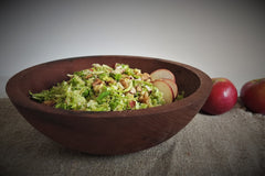 Brussels sprouts salad served in a wooden bowl