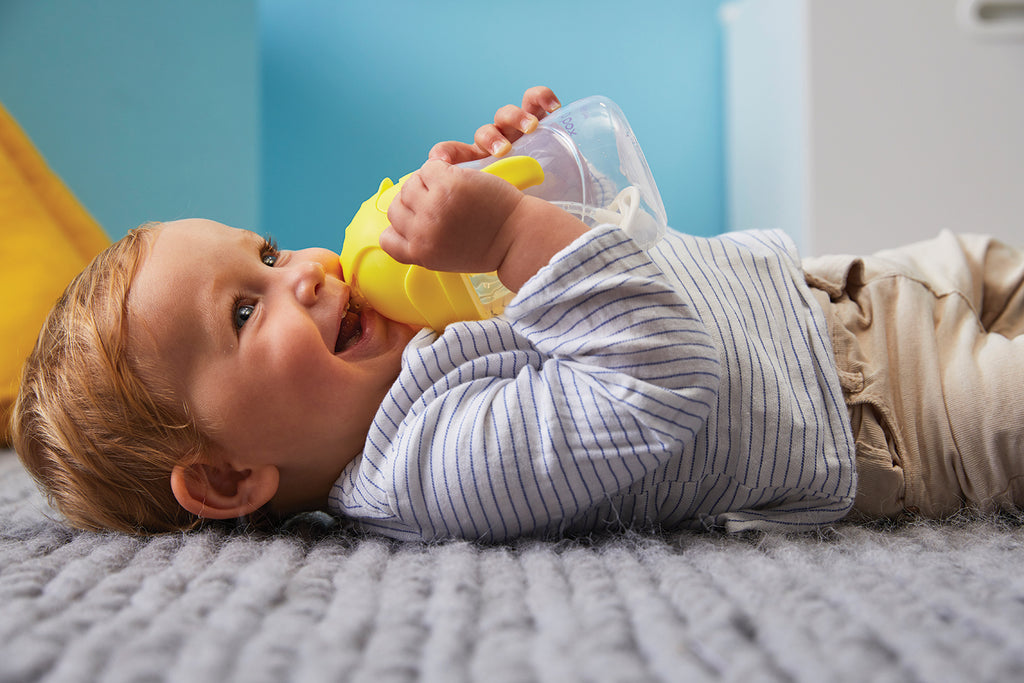 toddler drinking out of b.box sippy cup at any angle