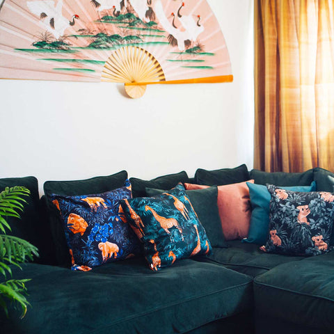Printed Cushions On Velvet Sofa