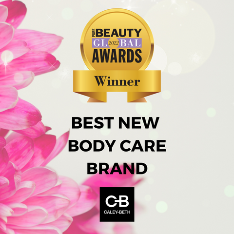 Caley-Beth with Pure Beauty Global Award 2022 gold winners badge, in the Best New Body Care Brand category.