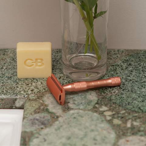 Caley-Beth moisturizing Shave Balm Bar with rose gold safety razor.