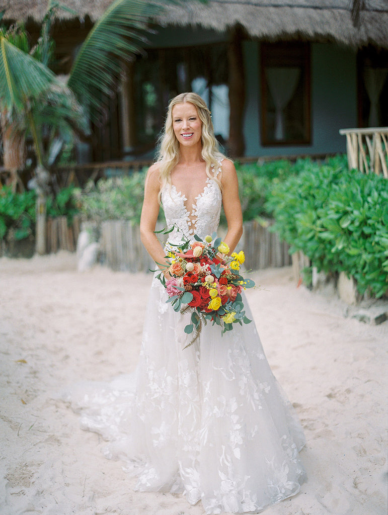 may áo cưới cho đám cưới bãi biển