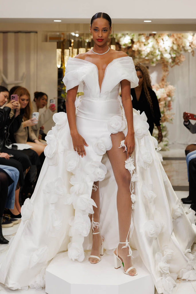 oversized rosettes slit wedding gown