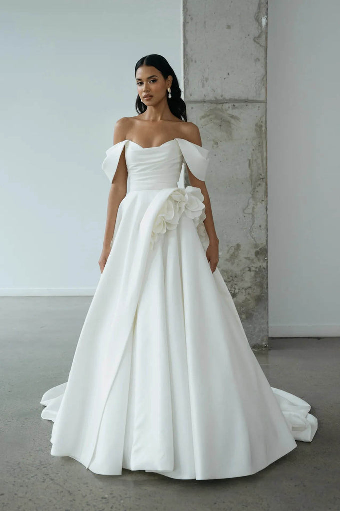 spring 2025 minimalist wedding dress with 3d floral
