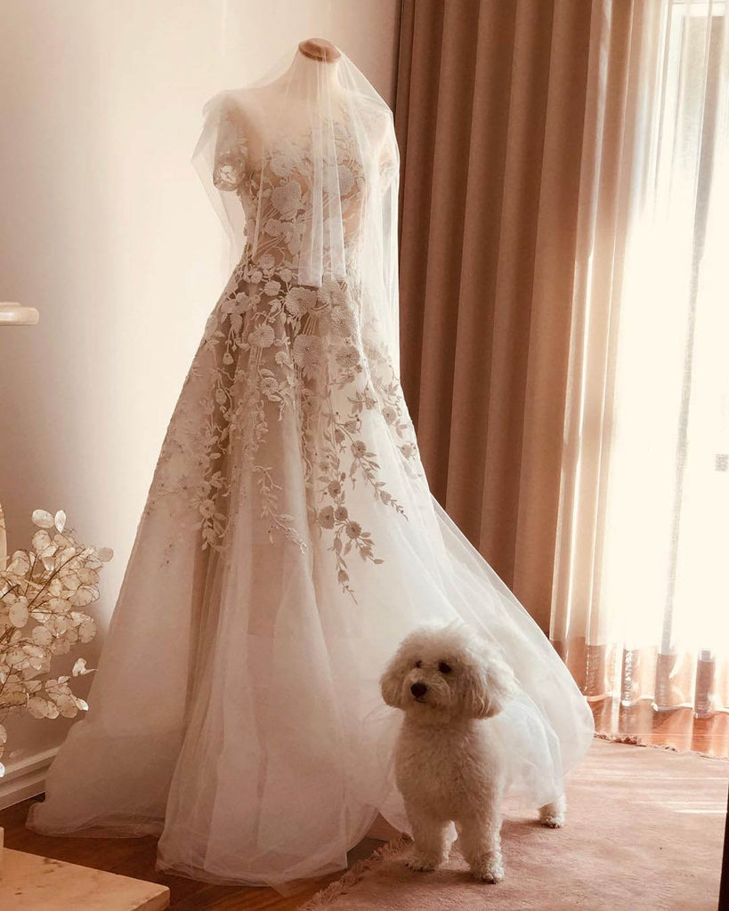 thương hiệu váy cưới reem acra