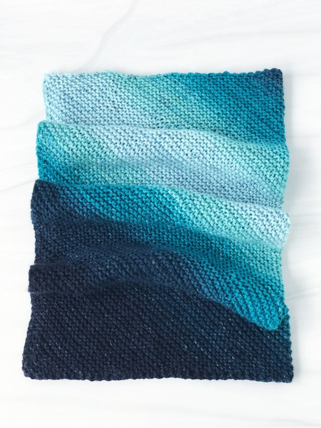 A folded ombre blanket