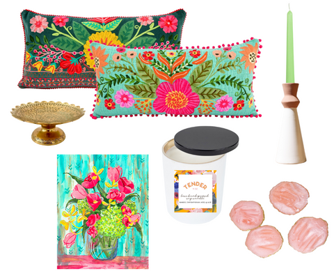 Spring 2022 Be Bright Box Reveal: floral embroidered pillow, original artwork (still life in a vase), marbled resin coasters, terracotta candlestick holder with green taper candle, a vintage brass dish, and a hand-poured soy candle.