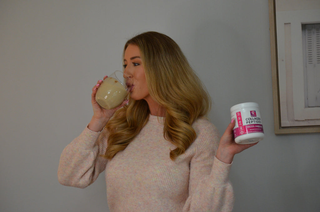 woman drinking smoothie