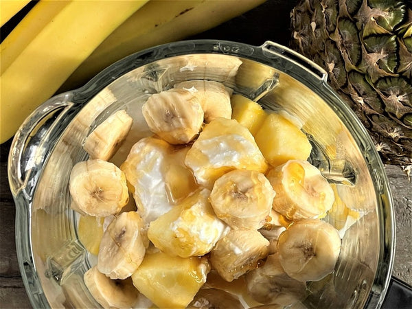 Bananas in blender for pineapple smoothie