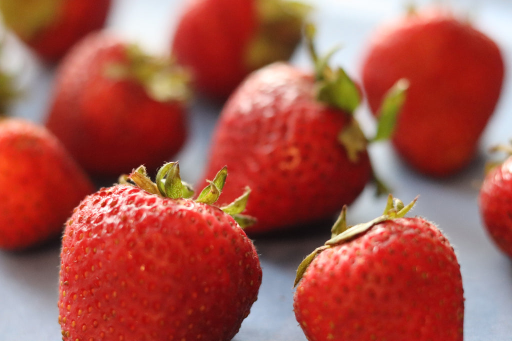 Photo of strawberries on a blue background