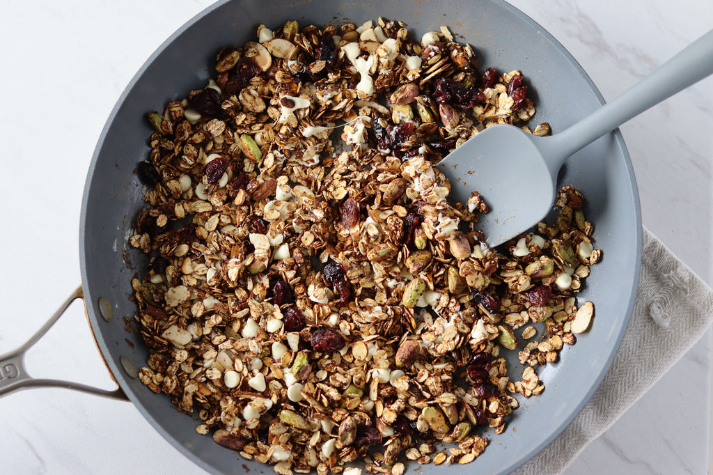 Stovetop Winter Crunch Granola with craisins, pistachios, and white chocolate