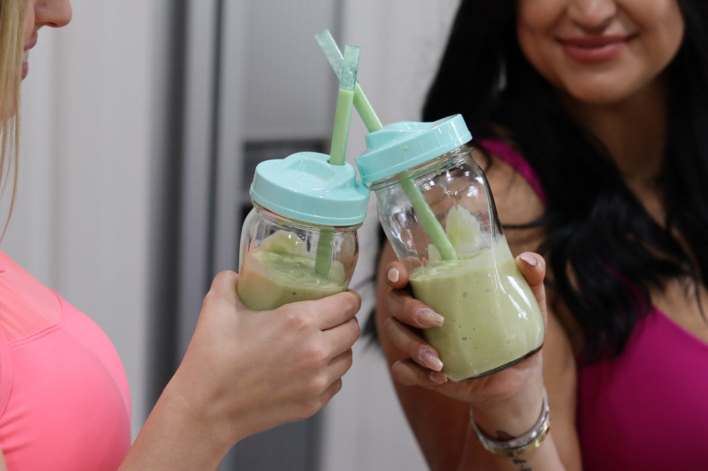 Two Friends Drinking Green Smoothies with Collagen