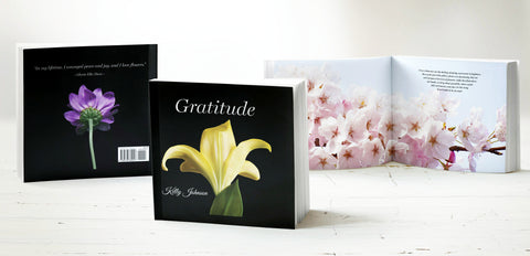 Gratitude book covers front and book and a photo cherry blossoms by photographer Kelly Johnson