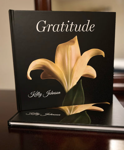 A lily on the book cover of Gratitude Kelly Johnson