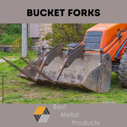 Heavy duty bucket forks attached to an orange forklift